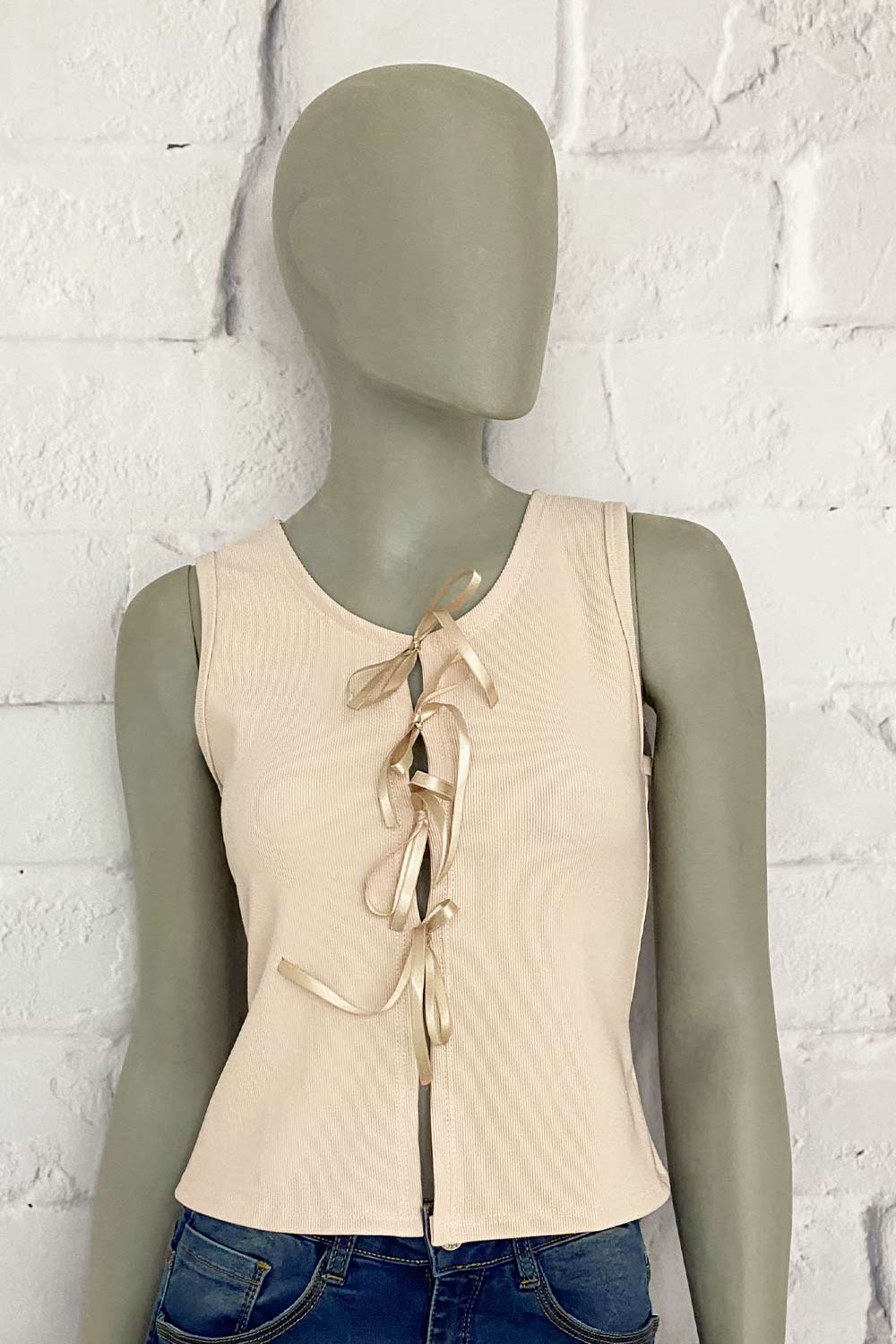 BLUSA MUJER ABERTURAS DELANTERAS CON MOÑO TELA ACANALADA