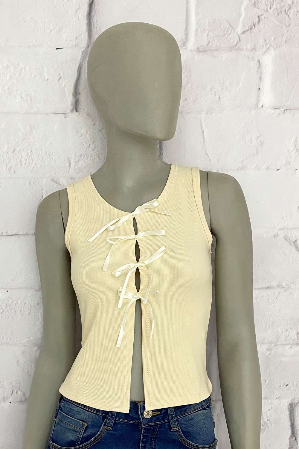 BLUSA MUJER ABERTURAS DELANTERAS CON MOÑO TELA ACANALADA